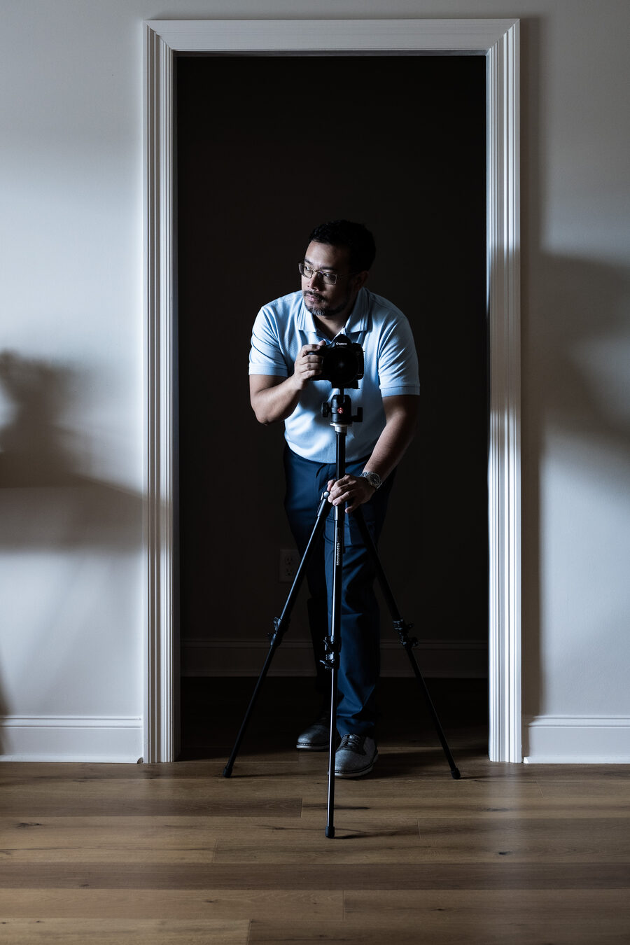 Franz Joseph De Leon, real estate photographer, shooting an interior in Madison, Mississippi